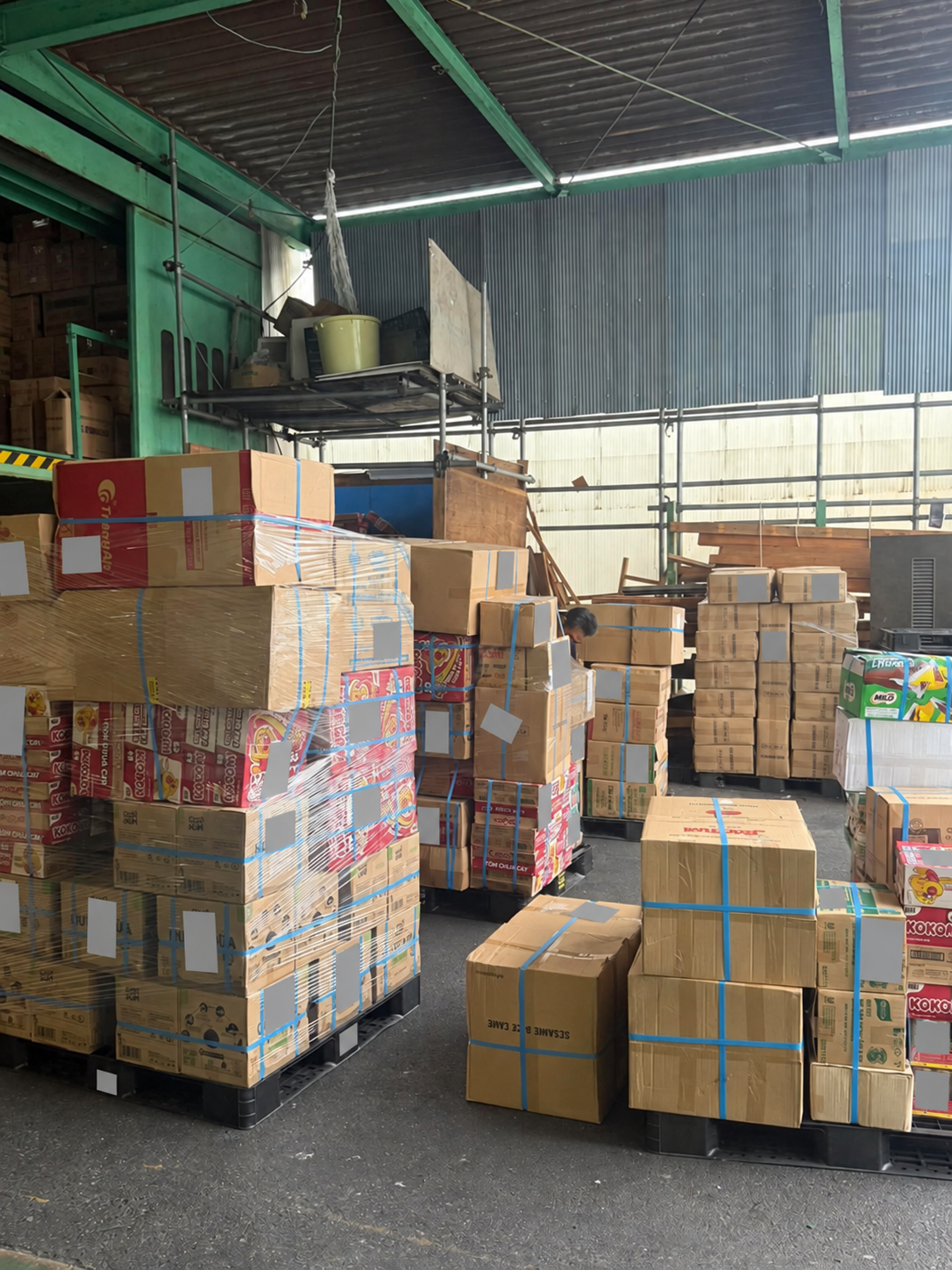 Palletised cartons inside a storage area