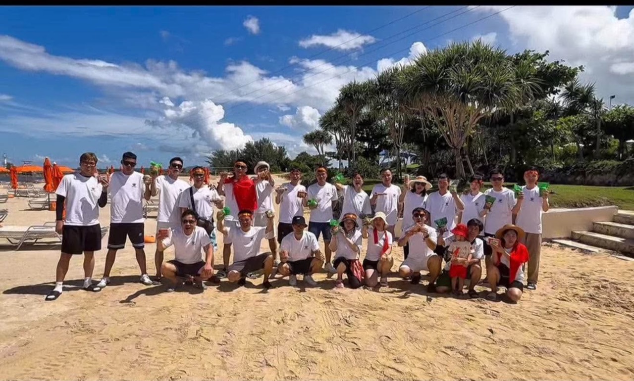 Team gathering at the beach